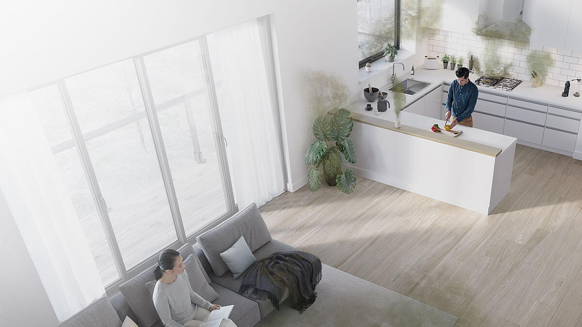 Obývací pokoj s čističkou vzduchu se zvlhčovačem a vypouštěným proudem vzduchu